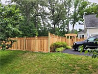 <b>Cedar Vertical Board Fence w 6x6 Pressure-Treated Posts, Cedar Closed Spindles, Bottom 1x6 Cedar Fascia Boards, and Cedar New England Post Caps. Also shown is a cedar single walk gate with straight top and trellis.</b>