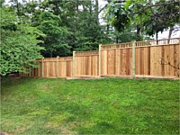 <b>Level and Stepped 5 foot, 6 foot, 7 foot Cedar Vertical Board Fence w 6x6 Pressure-Treated Posts, Cedar Closed Spindles, Bottom 1x6 Cedar Fascia Boards, and Cedar New England Post Caps.</b>