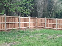 <b>6' high cedar board and batten privacy fencing with 6x6 post and cedar New England post caps.</b>